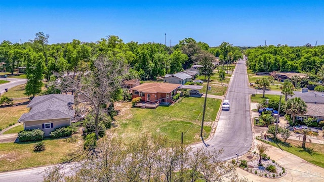 birds eye view of property with a residential view
