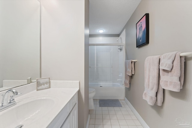 full bathroom featuring tile patterned flooring, bath / shower combo with glass door, vanity, a textured ceiling, and toilet