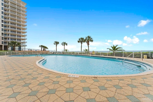 view of swimming pool featuring a patio