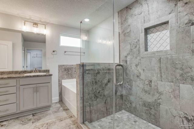 1825 Peace Ter, Cantonment, FL 32533 - full bath with a garden tub, vanity, a textured ceiling, and a stall shower