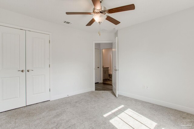 1825 Peace Ter, Cantonment, FL 32533 - unfurnished bedroom featuring visible vents, a ceiling fan, carpet floors, a closet, and baseboards