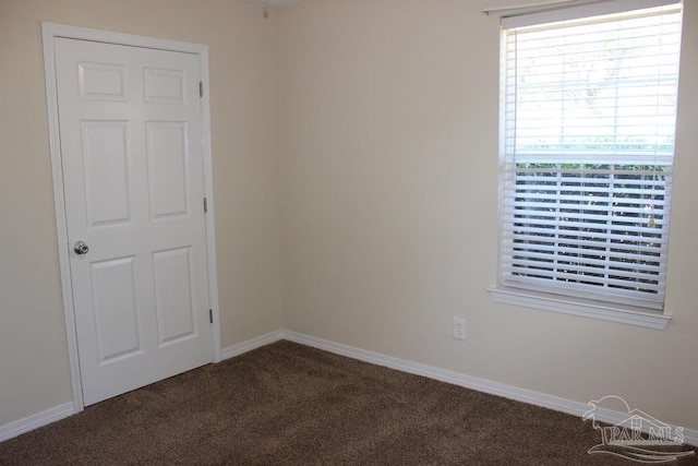 unfurnished room featuring carpet floors