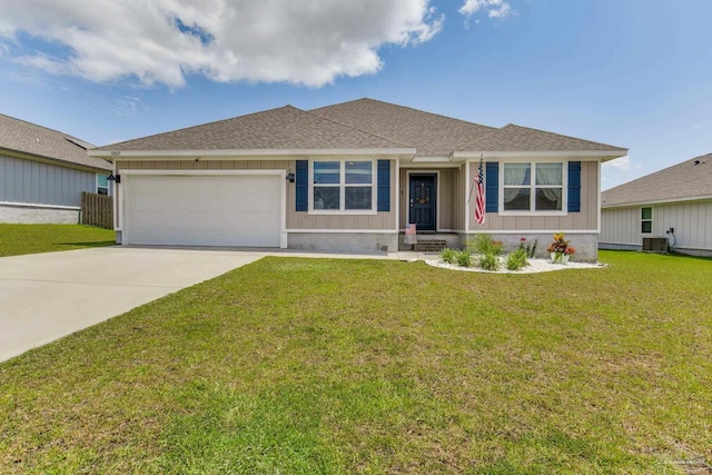 10869 Blacktail Loop, Pensacola, FL 32526 - ranch-style house featuring board and batten siding, an attached garage, concrete driveway, and a front lawn