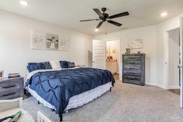 10869 Blacktail Loop, Pensacola, FL 32526 - carpeted bedroom with ensuite bath, a ceiling fan, and recessed lighting