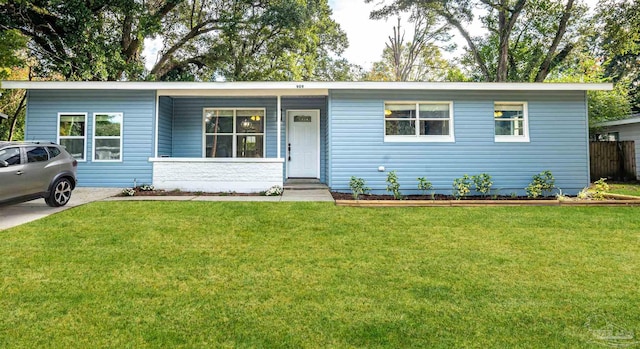 ranch-style home with a front yard