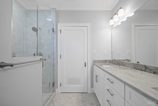 full bath featuring visible vents, crown molding, a shower stall, and vanity