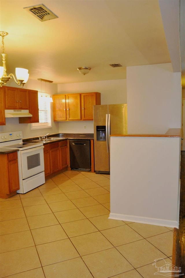 kitchen featuring white electric range oven, visible vents, stainless steel fridge with ice dispenser, under cabinet range hood, and dishwasher