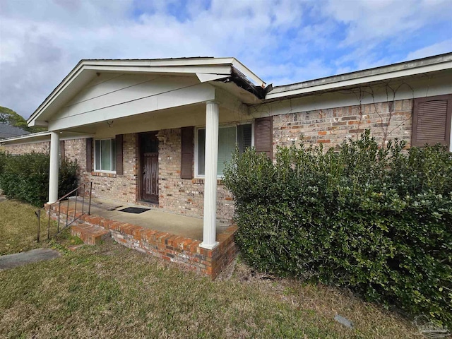 doorway to property with covered porch