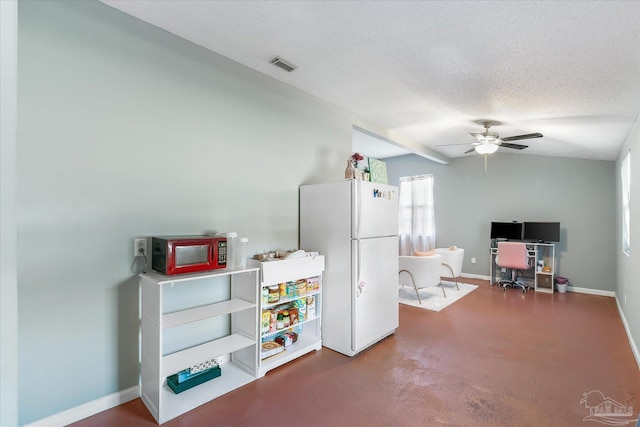 rec room featuring ceiling fan and a textured ceiling