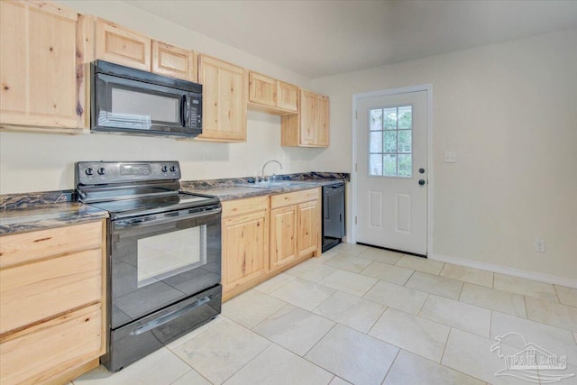 4670 Durham Dr, Pensacola, FL 32526 - kitchen with black appliances, light brown cabinetry, a sink, baseboards, and light tile patterned flooring