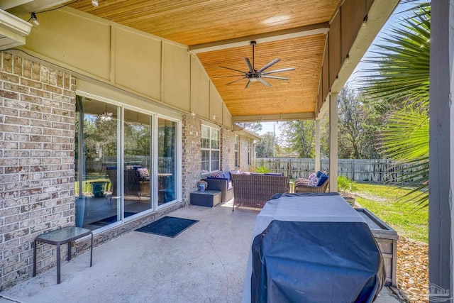 view of patio / terrace featuring ceiling fan, an outdoor hangout area, and grilling area