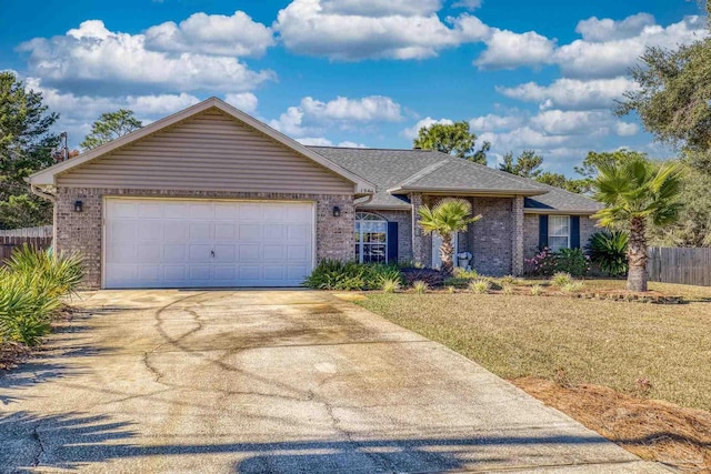 ranch-style house with a garage and a front lawn