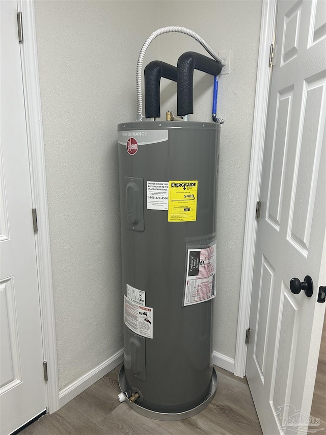 utility room with water heater