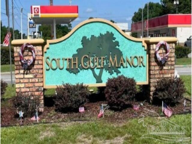 view of community sign