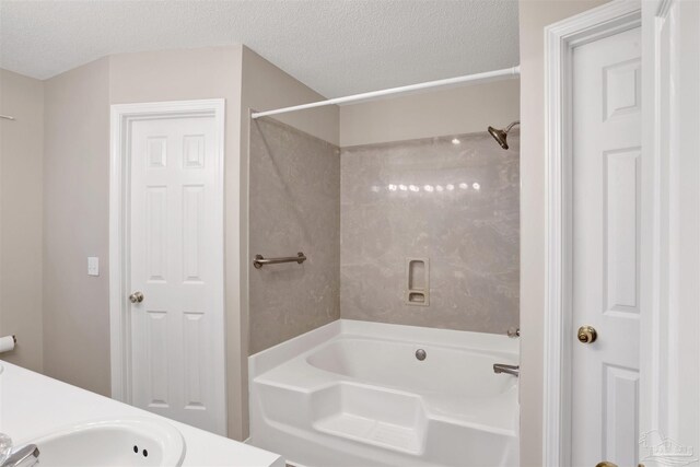 bathroom with vanity, toilet, hardwood / wood-style floors, and a textured ceiling