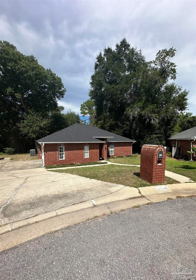 exterior space featuring a front lawn