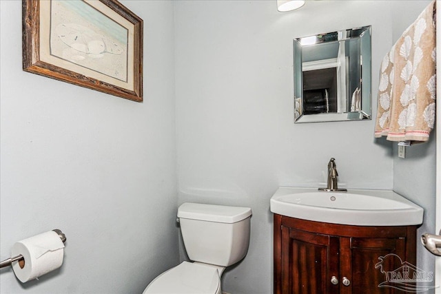 342 Ft Pickens Rd, Pensacola Beach, FL 32561 - half bathroom featuring toilet and vanity