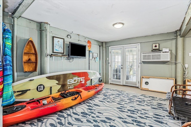 342 Ft Pickens Rd, Pensacola Beach, FL 32561 - game room with carpet floors, a wall unit AC, and french doors