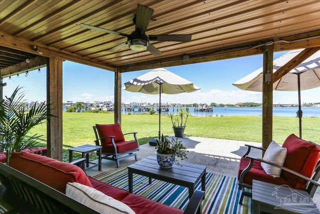 342 Ft Pickens Rd, Pensacola Beach, FL 32561 - view of patio featuring a water view, outdoor lounge area, and ceiling fan