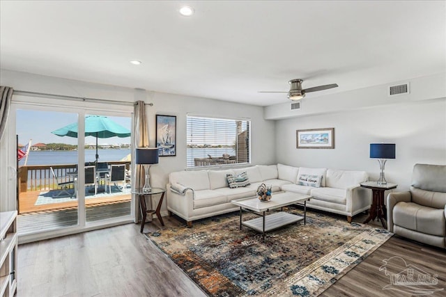 342 Ft Pickens Rd, Pensacola Beach, FL 32561 - living room featuring ceiling fan, wood finished floors, a water view, and recessed lighting