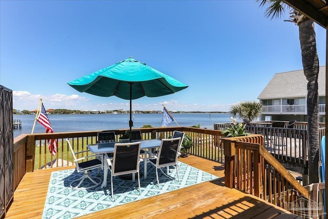 342 Ft Pickens Rd, Pensacola Beach, FL 32561 - deck with outdoor dining space and a water view