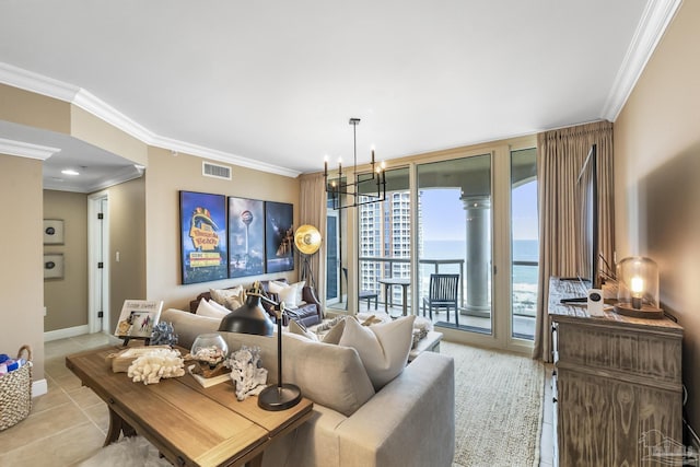 living room with a water view, crown molding, and visible vents