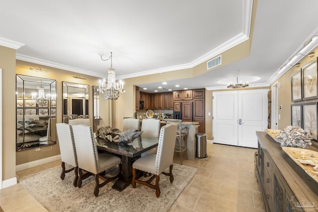 dining area with light tile patterned floors, baseboards, visible vents, ornamental molding, and a chandelier