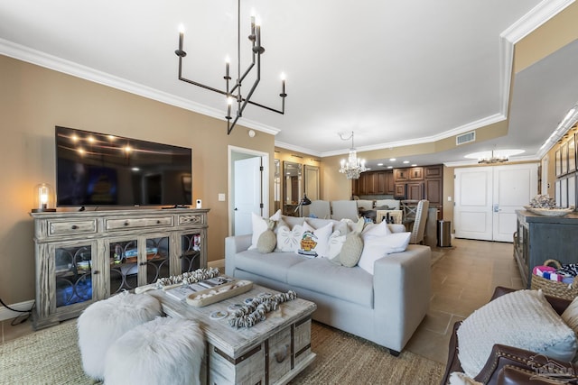 living area featuring baseboards, visible vents, ornamental molding, tile patterned floors, and a chandelier