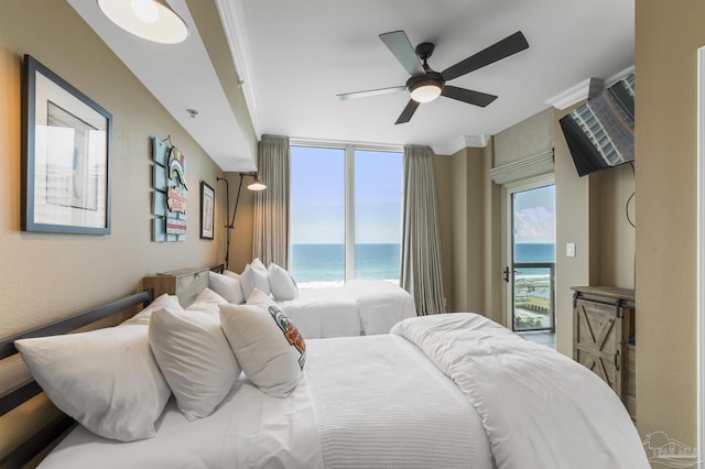 bedroom with access to outside, multiple windows, and a ceiling fan