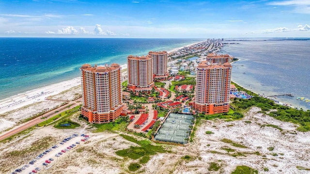 aerial view with a water view, a city view, and a view of the beach