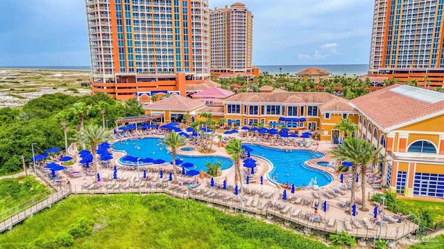 view of swimming pool with a water view