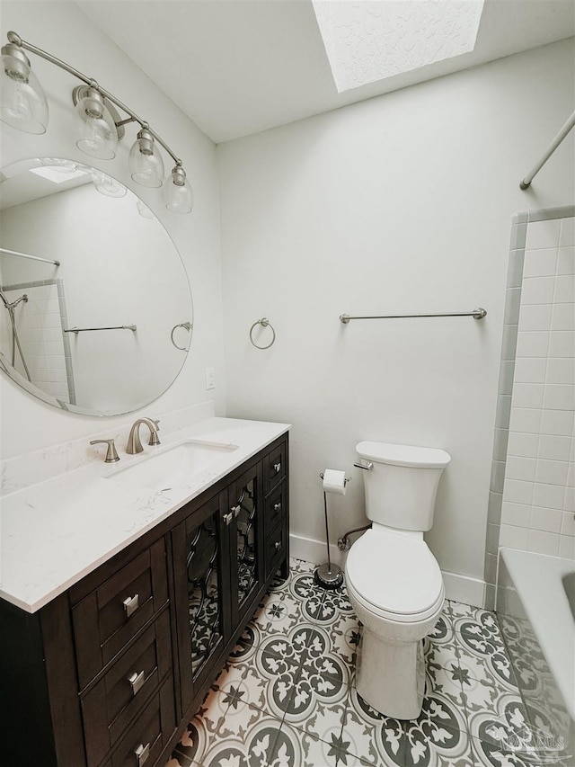 full bathroom featuring tile patterned floors, vanity, toilet, and shower / bathtub combination