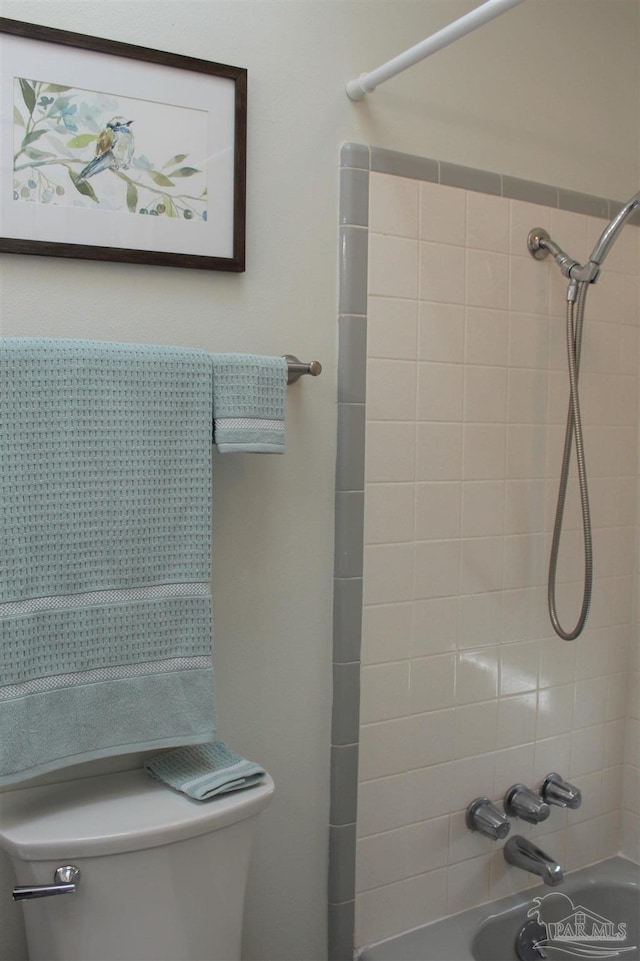 30 Woodham Ave, Ft Walton Beach, FL 32547 - bathroom featuring washtub / shower combination and toilet
