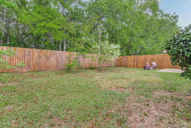 view of yard featuring a fenced backyard
