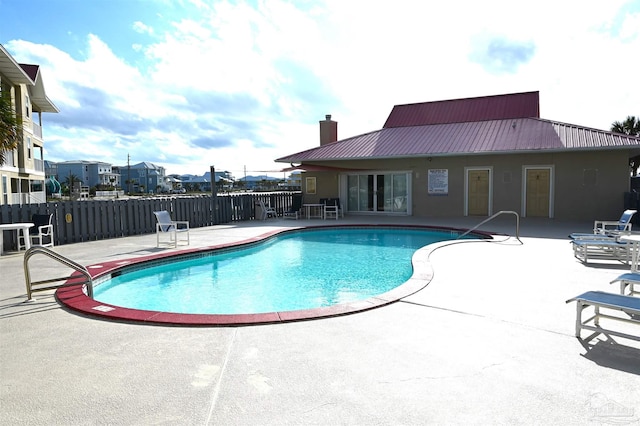 view of pool featuring a patio area