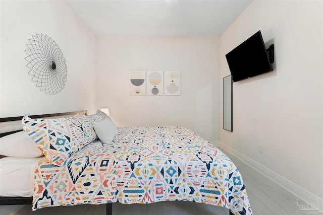 bedroom featuring hardwood / wood-style floors