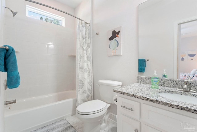 full bathroom featuring vanity, toilet, and shower / bath combo with shower curtain