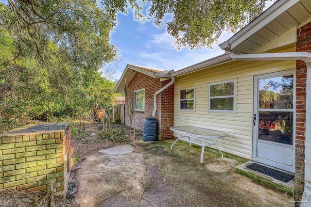 view of home's exterior with a patio area
