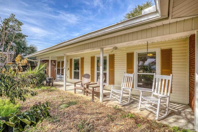 back of property featuring a porch