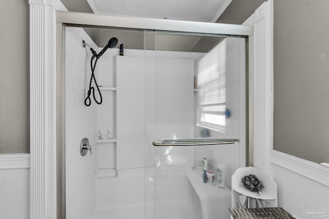 full bath featuring a stall shower