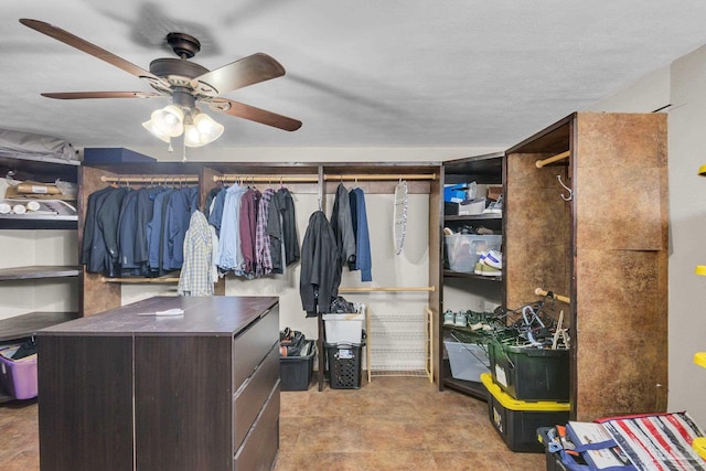 spacious closet featuring a ceiling fan