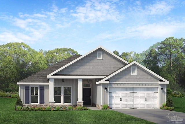 view of front of home with a garage and a front yard