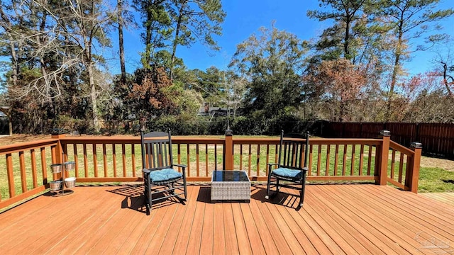 wooden deck featuring fence