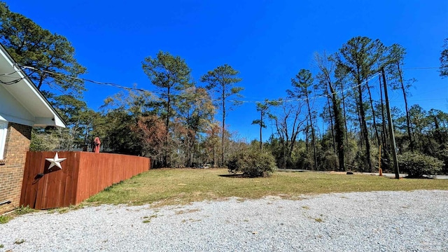 view of yard with fence