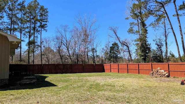 view of yard featuring a fenced backyard