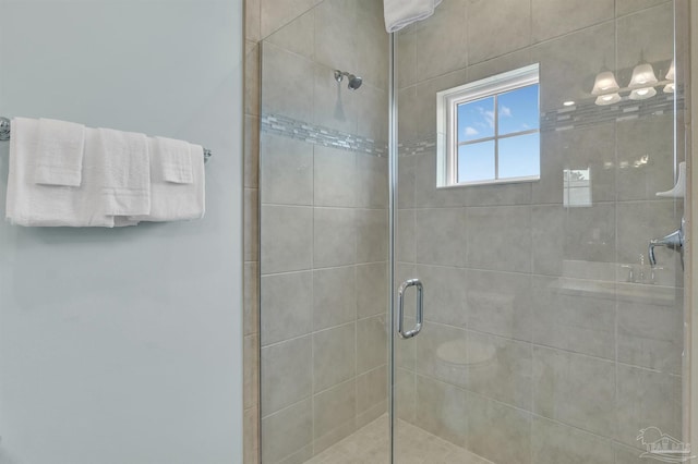 full bath featuring a shower stall