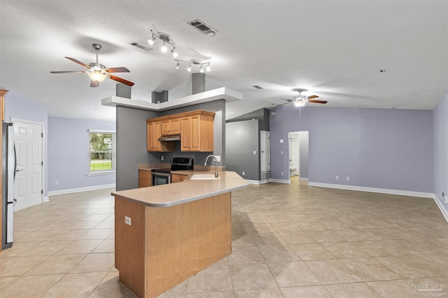 2759 Pleasant Bay Ct, Navarre, FL 32566 - kitchen featuring stainless steel appliances, a ceiling fan, a sink, light tile patterned floors, and under cabinet range hood