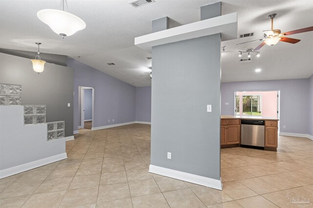 2759 Pleasant Bay Ct, Navarre, FL 32566 - spare room featuring a ceiling fan, lofted ceiling, light tile patterned floors, and baseboards
