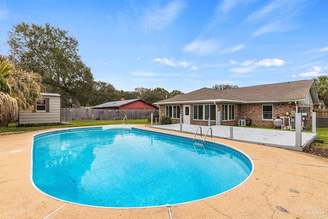 2759 Pleasant Bay Ct, Navarre, FL 32566 - view of pool with a patio and a fenced backyard