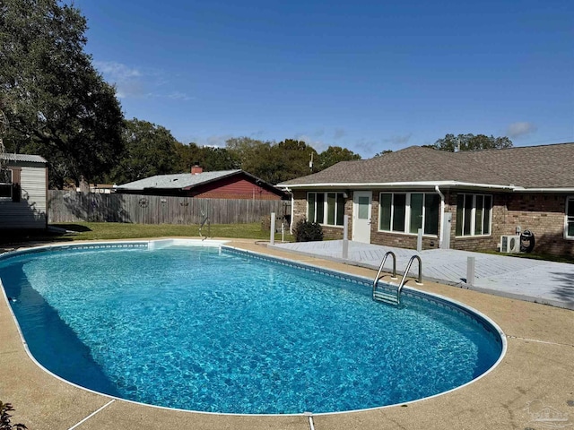 2759 Pleasant Bay Ct, Navarre, FL 32566 - view of swimming pool with a patio